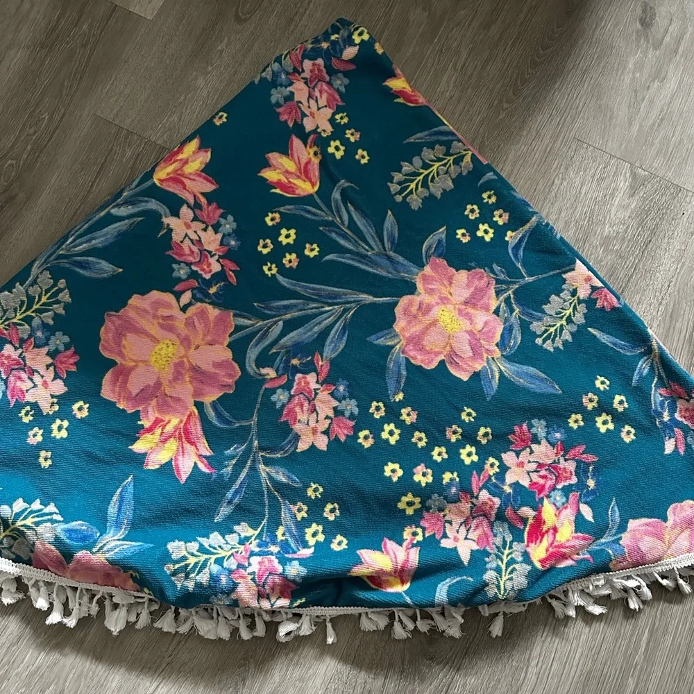 Adore Me round beach towel with tassels. 60” in diameter.